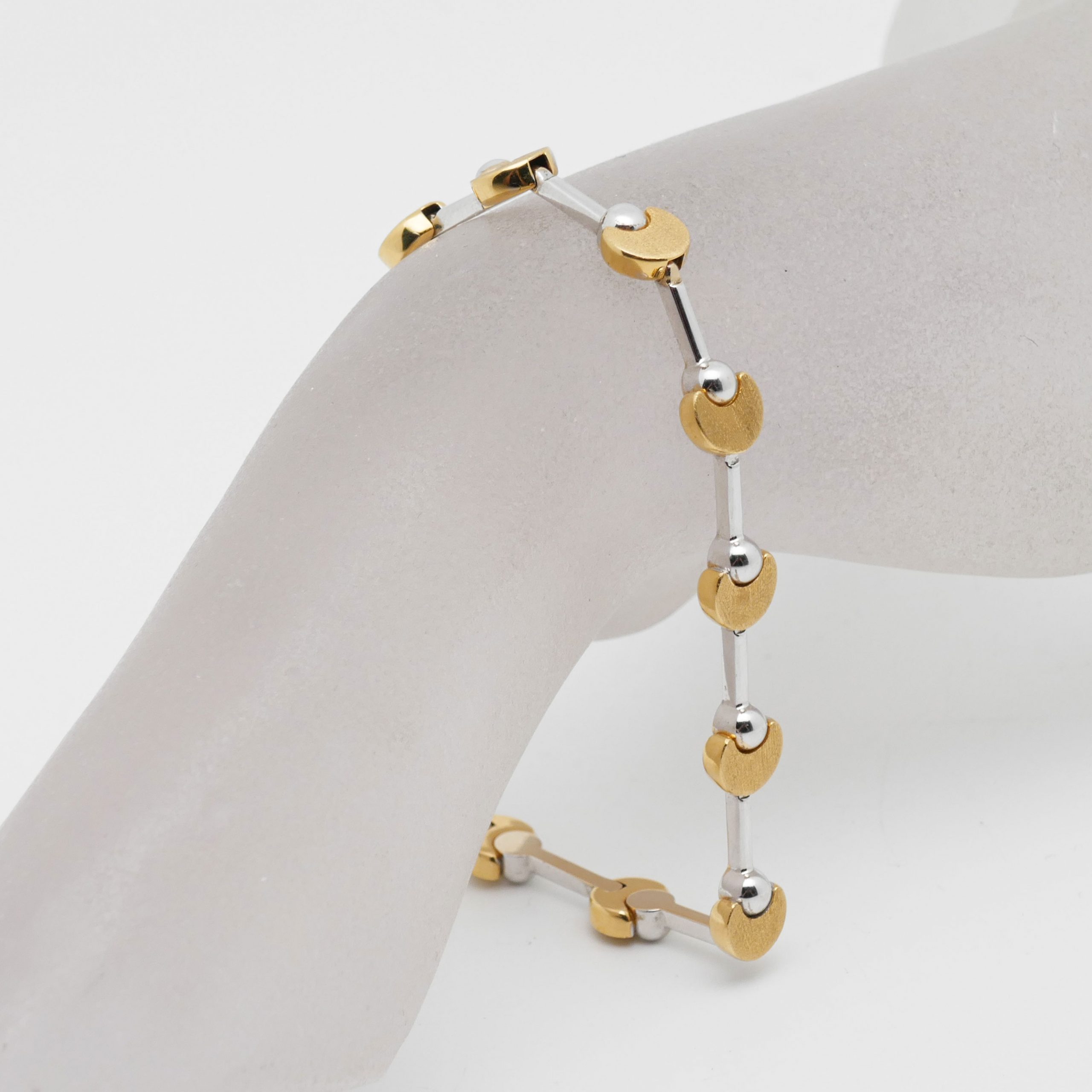 Bicolor-Armband aus 750 Gold mit geometrischen Gliedern