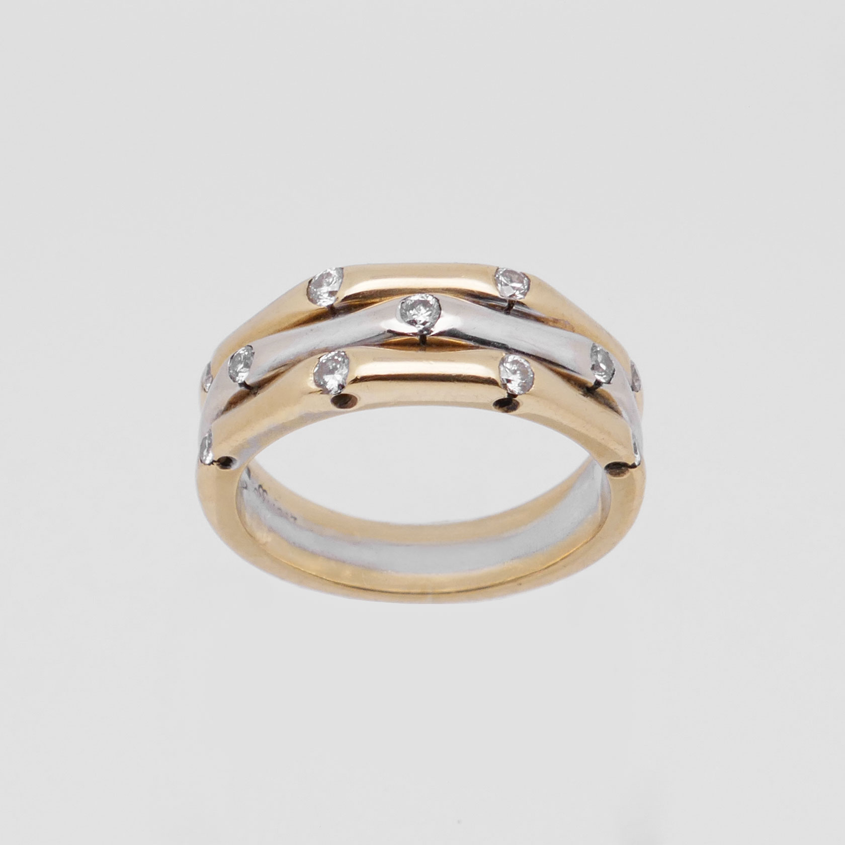 Verzierte Bicolor Ring aus 750 Gold mit 11 Diamanten