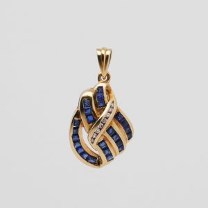 Kettenanhänger aus 750 Gelbgold mit Diamanten und blauen Steinen