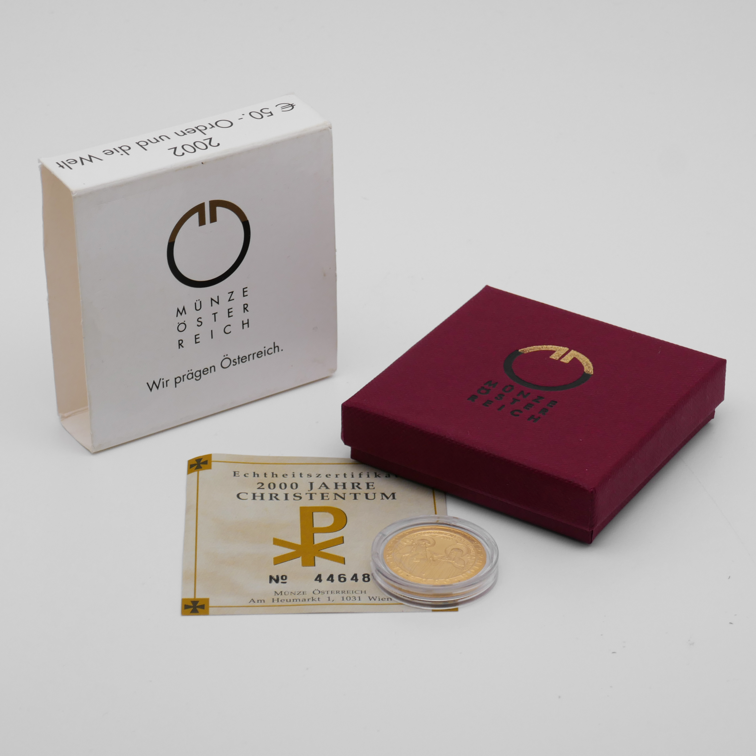 Goldmünze mit Etui, Umkarton und Echtheitszertifikat
